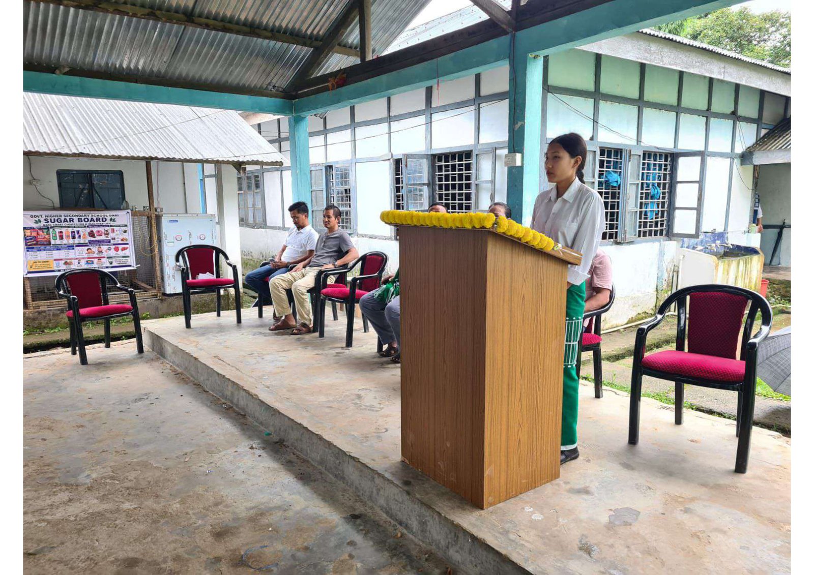 Student participating in an extempore speech programme